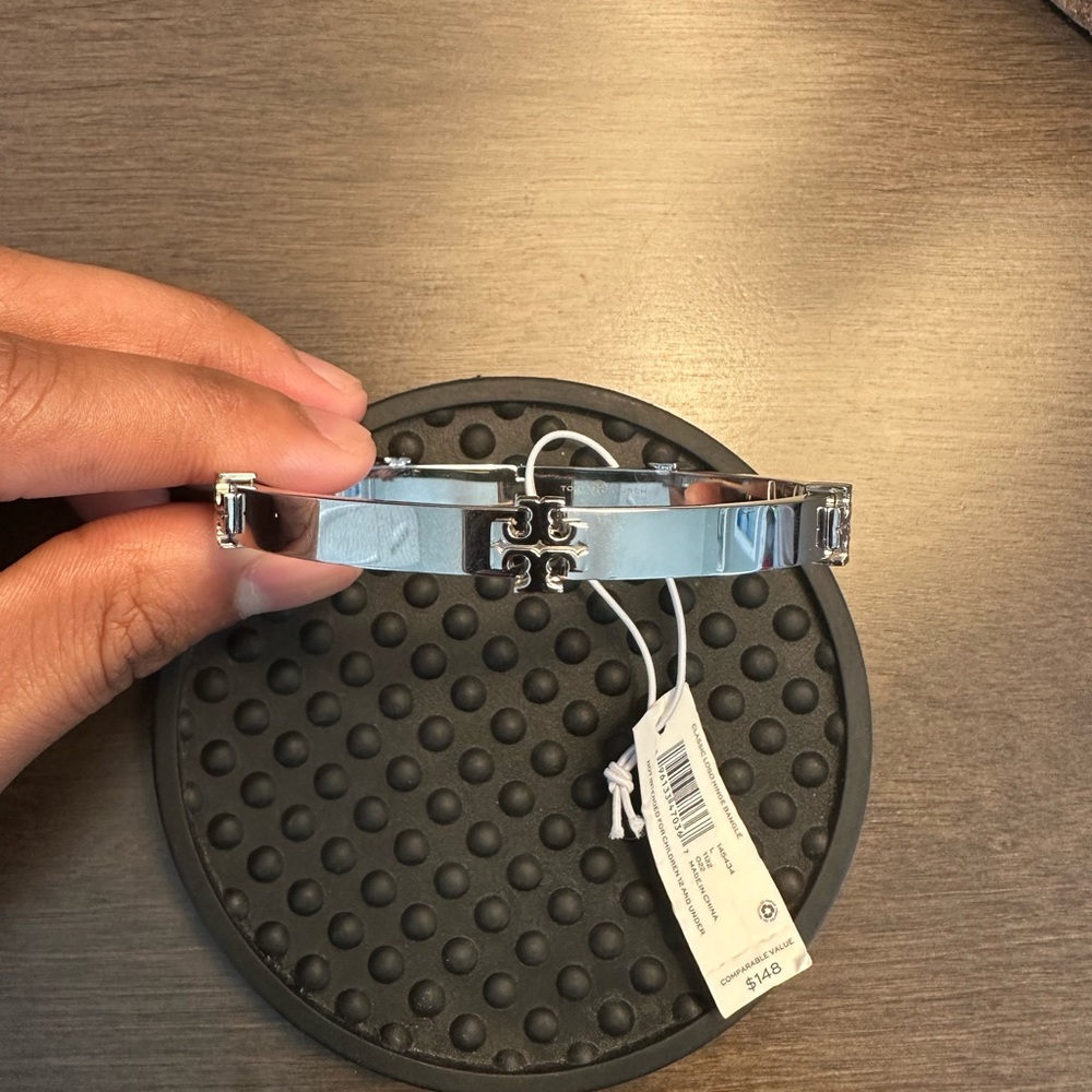 Tory Burch classic logo hinge bangle. Brand new never worn size large.